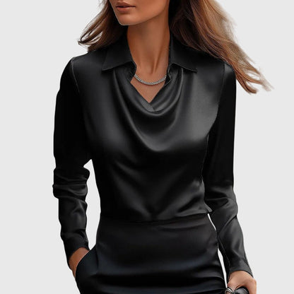 Elegant blouse featuring a pleated neckline and a flowing fit, perfect for versatile women's fashion. 2