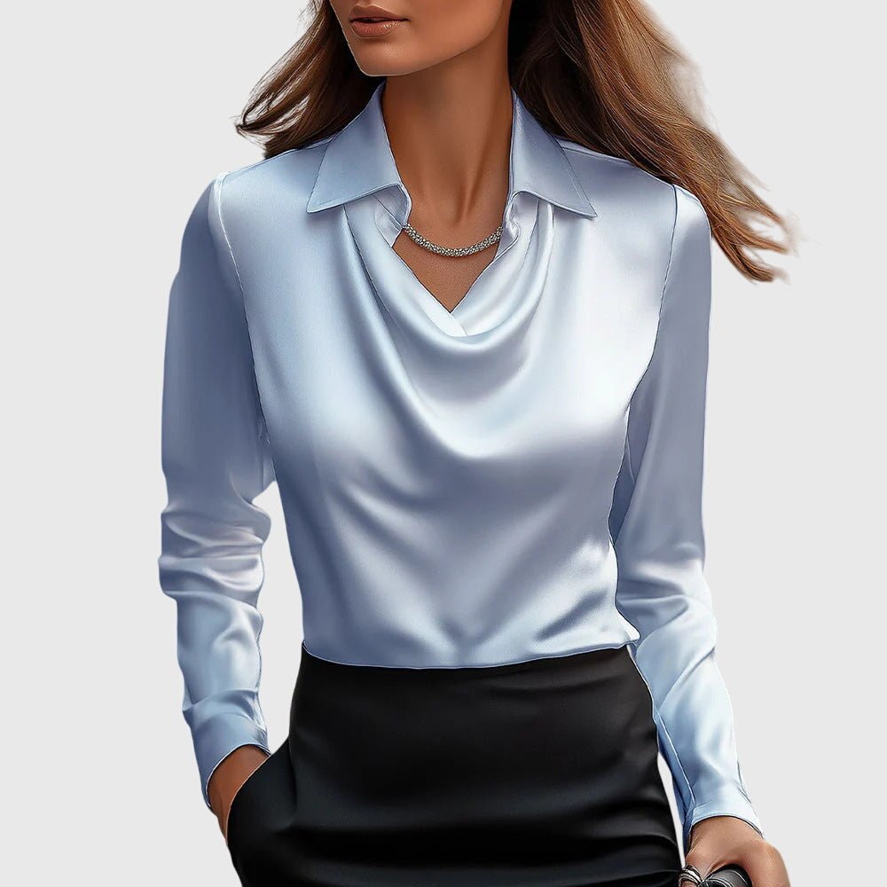 Elegant blouse featuring a pleated neckline and a flowing fit, perfect for versatile women's fashion. 3