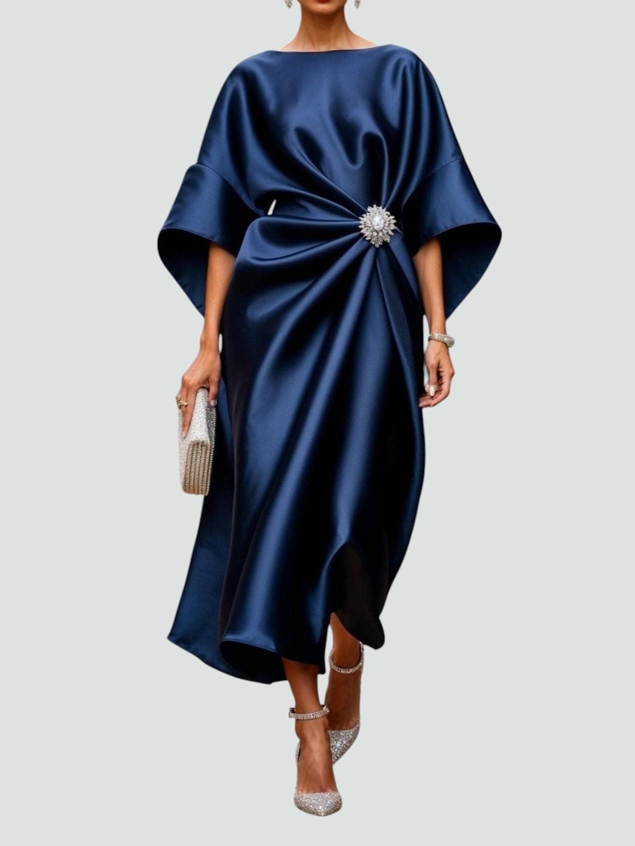 Elegant evening dress featuring a luxurious shine and a timeless silhouette, perfect for formal occasions and special events. 0