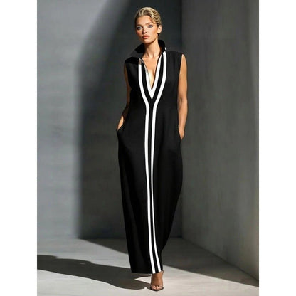 Elegant evening gown featuring a front zipper and side slit, designed in a navy and white contrast, perfect for formal events and wedding guests. 3