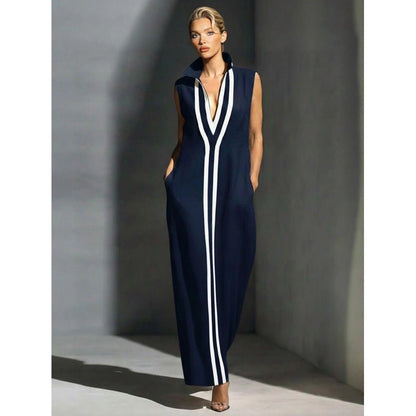 Elegant evening gown featuring a front zipper and side slit, designed in a navy and white contrast, perfect for formal events and wedding guests. 0