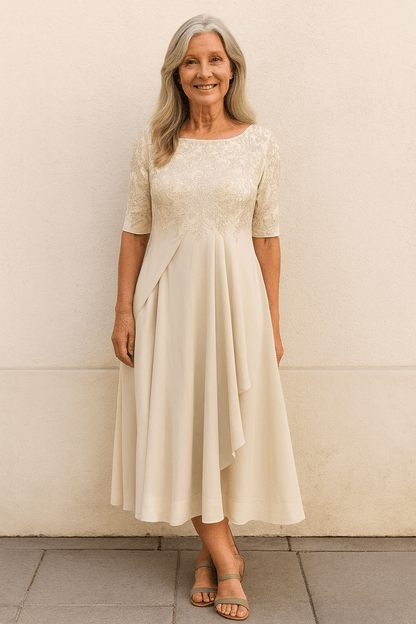 Elegant lace dress featuring a layered skirt, perfect for weddings and formal occasions, crafted from lightweight fabric for comfort and style. 2
