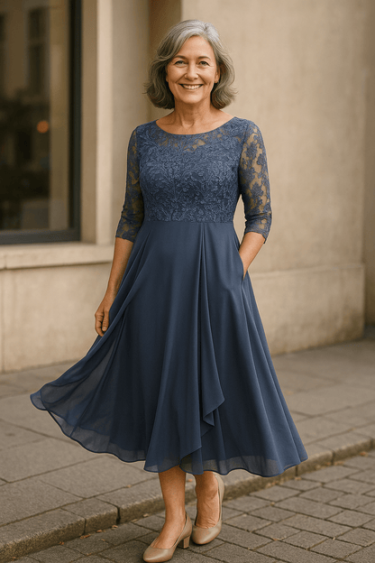 Elegant lace dress featuring a layered skirt, perfect for weddings and formal occasions, crafted from lightweight fabric for comfort and style. 0
