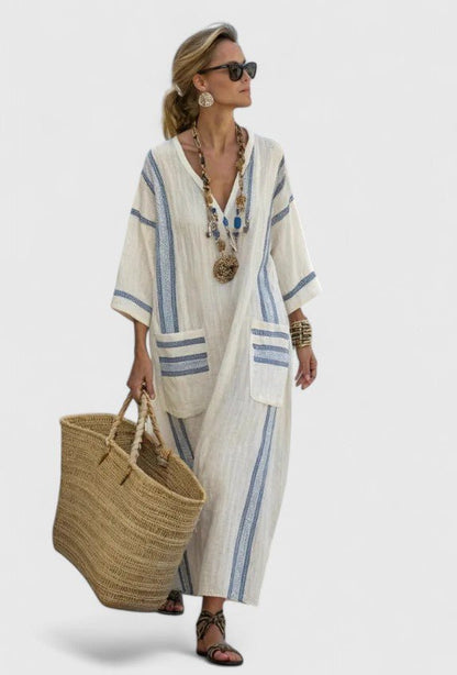 Elegant maxi dress featuring a timeless silhouette and flattering fit, perfect for any occasion, showcased in a vibrant color and flowing fabric. 4