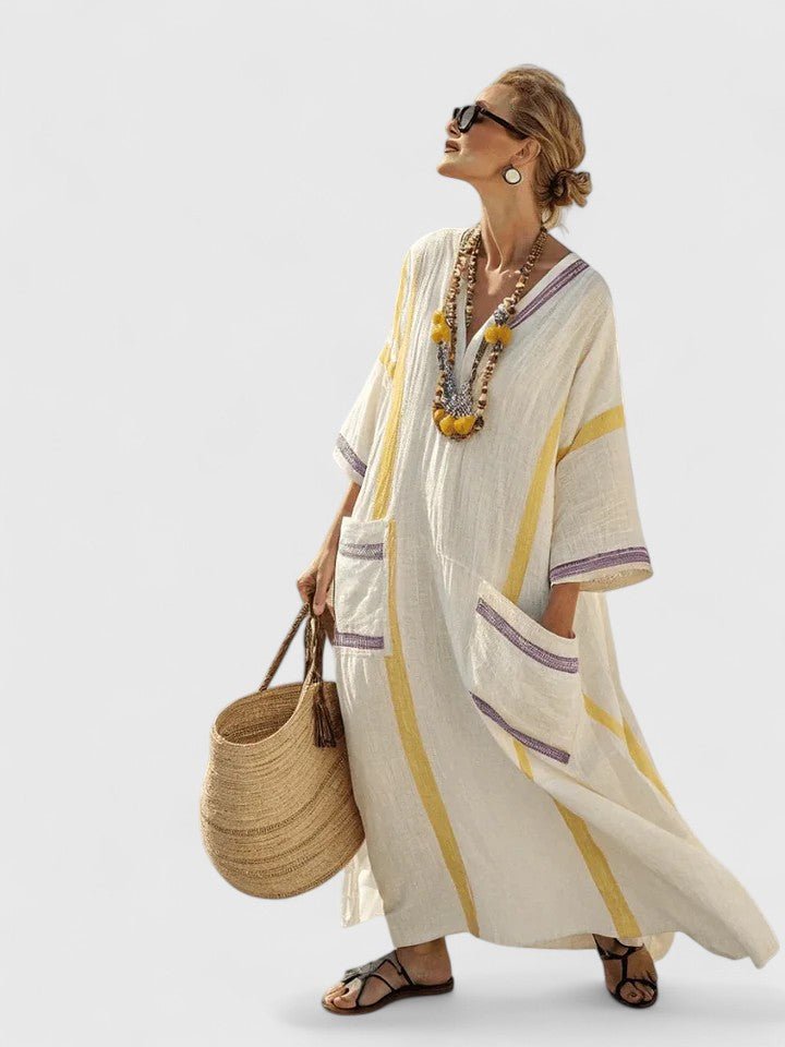 Elegant maxi dress featuring a timeless silhouette and flattering fit, perfect for any occasion, showcased in a vibrant color and flowing fabric. 6