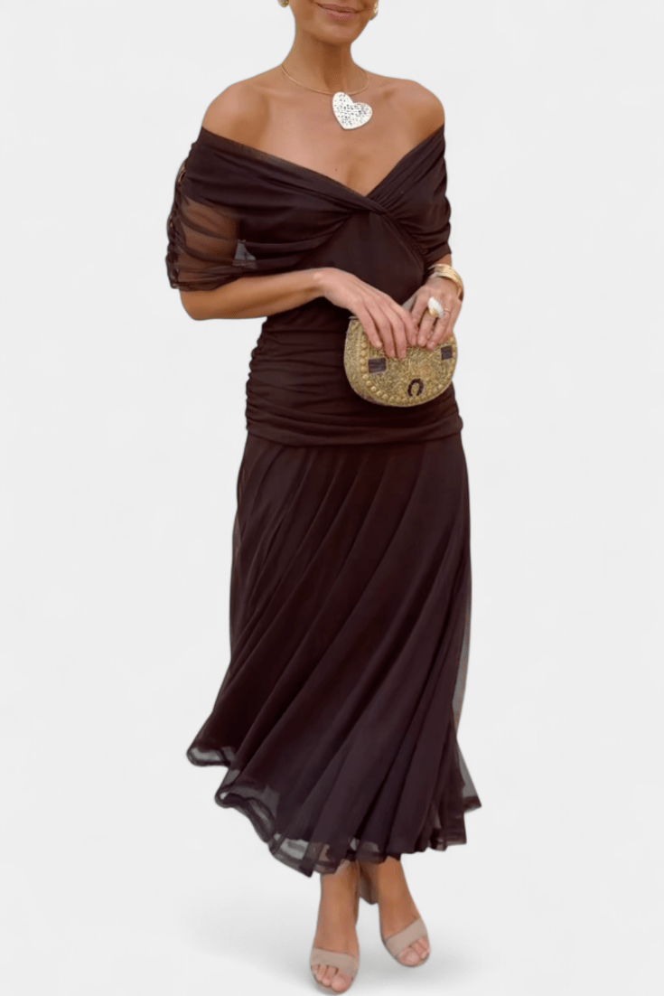Elegant off-shoulder evening dress featuring draped fabric and a ruched bodice, perfect for formal occasions and special events. 5