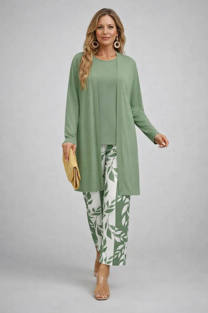Elegant three-piece set featuring botanical print trousers, designed for plus size women, offering a lightweight and breathable casual outfit perfect for everyday wear. 3