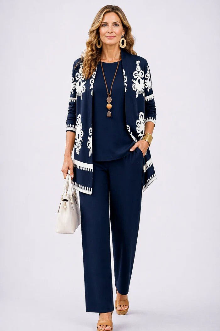 Elegant three-piece set featuring botanical print trousers, designed for plus size women, offering a lightweight and breathable casual outfit perfect for everyday wear. 7
