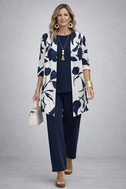 Elegant three-piece set featuring botanical print trousers, designed for plus size women, offering a lightweight and breathable casual outfit perfect for everyday wear. 8