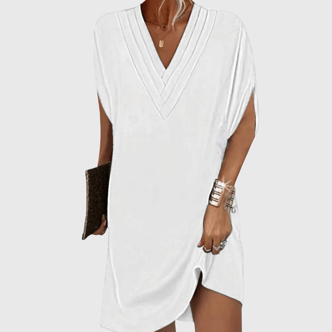 Elegant tummy-hiding dress featuring a flattering V-neckline, designed for versatile fit suitable for any occasion. 5