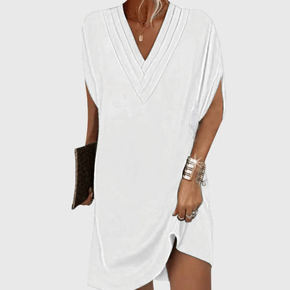 Elegant tummy-hiding dress featuring a flattering V-neckline, designed for versatile fit suitable for any occasion. 5