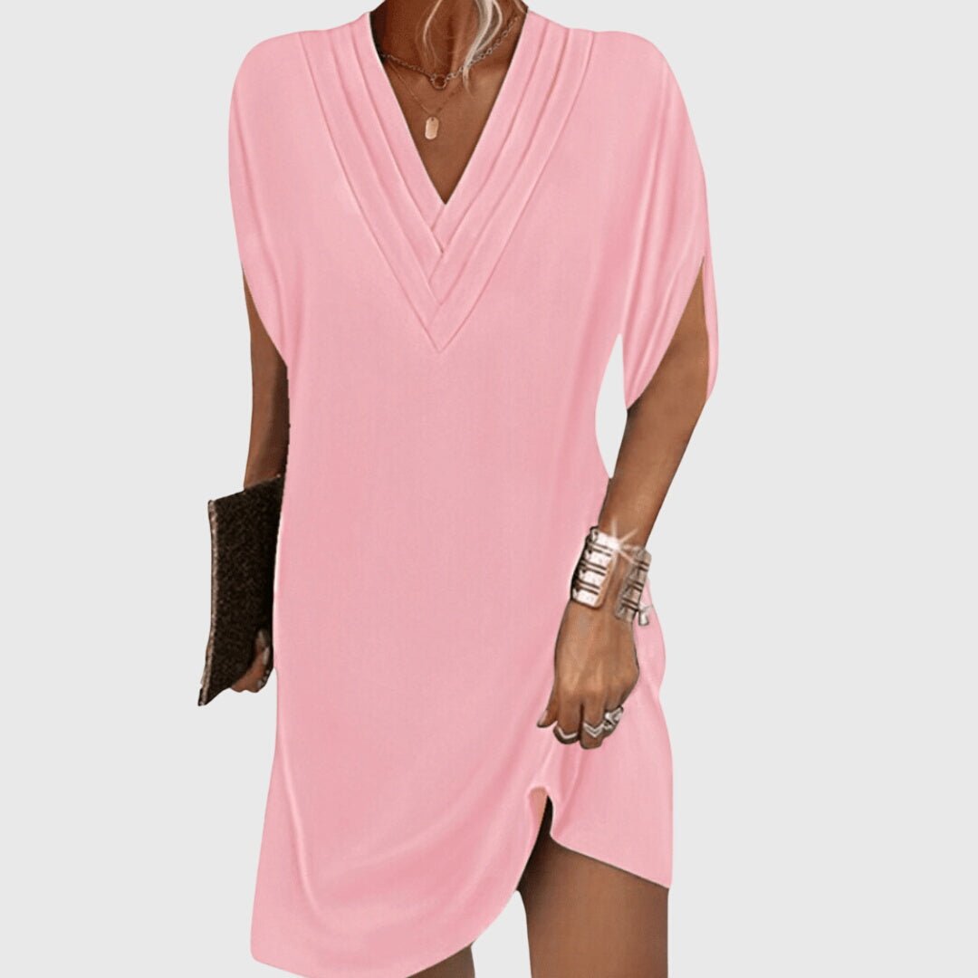 Elegant tummy-hiding dress featuring a flattering V-neckline, designed for versatile fit suitable for any occasion. 2