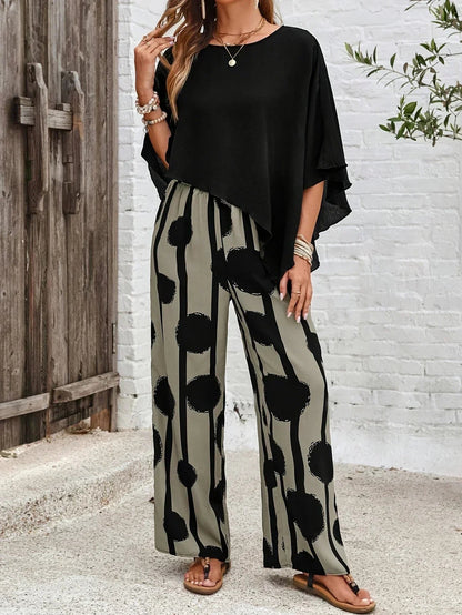 Elegant two-piece set for women featuring an elastic waistband, made from soft breathable fabric, perfect for comfortable casual wear. 0