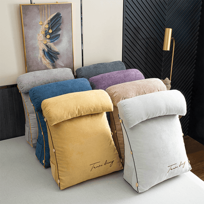 Ergonomic reading pillow designed for bed, featuring neck support, a soft cotton linen cover, and a convenient side pocket for books or devices, ideal 1