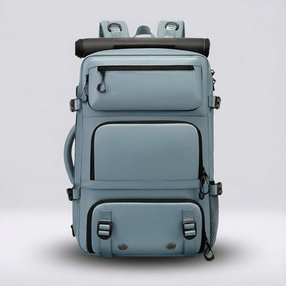 Ergonomic dark blue travel backpack featuring a waterproof exterior and a convenient integrated shoe compartment, perfect for travelers and outdoor enthusiasts. 8
