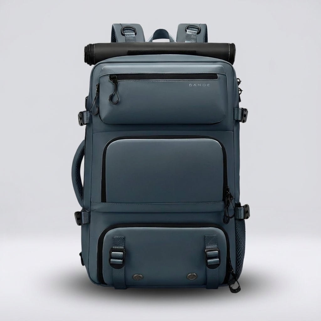 Ergonomic dark blue travel backpack featuring a waterproof exterior and a convenient integrated shoe compartment, perfect for travelers and outdoor enthusiasts. 0
