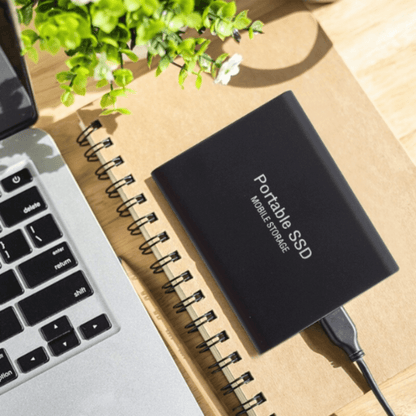 External SSD portable drive featuring high-speed USB-C connectivity and a waterproof design, perfect for on-the-go storage and data protection. 3