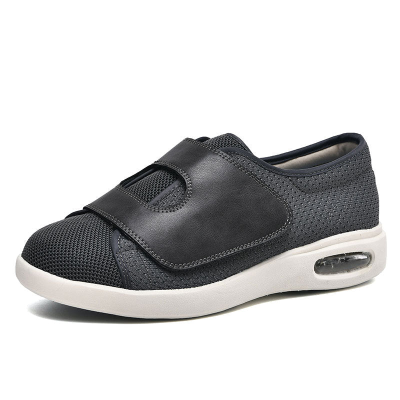 Extra wide diabetic walking shoes featuring adjustable Velcro straps and breathable mesh design, perfect for swollen feet and enhanced comfort. 2
