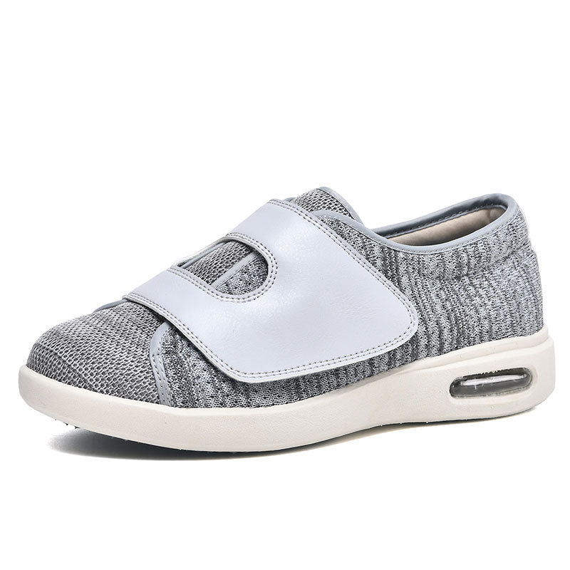 Extra wide diabetic walking shoes featuring adjustable Velcro straps and breathable mesh design, perfect for swollen feet and enhanced comfort. 0