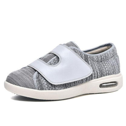 Extra wide diabetic walking shoes featuring adjustable Velcro straps and breathable mesh design, perfect for swollen feet and enhanced comfort. 0