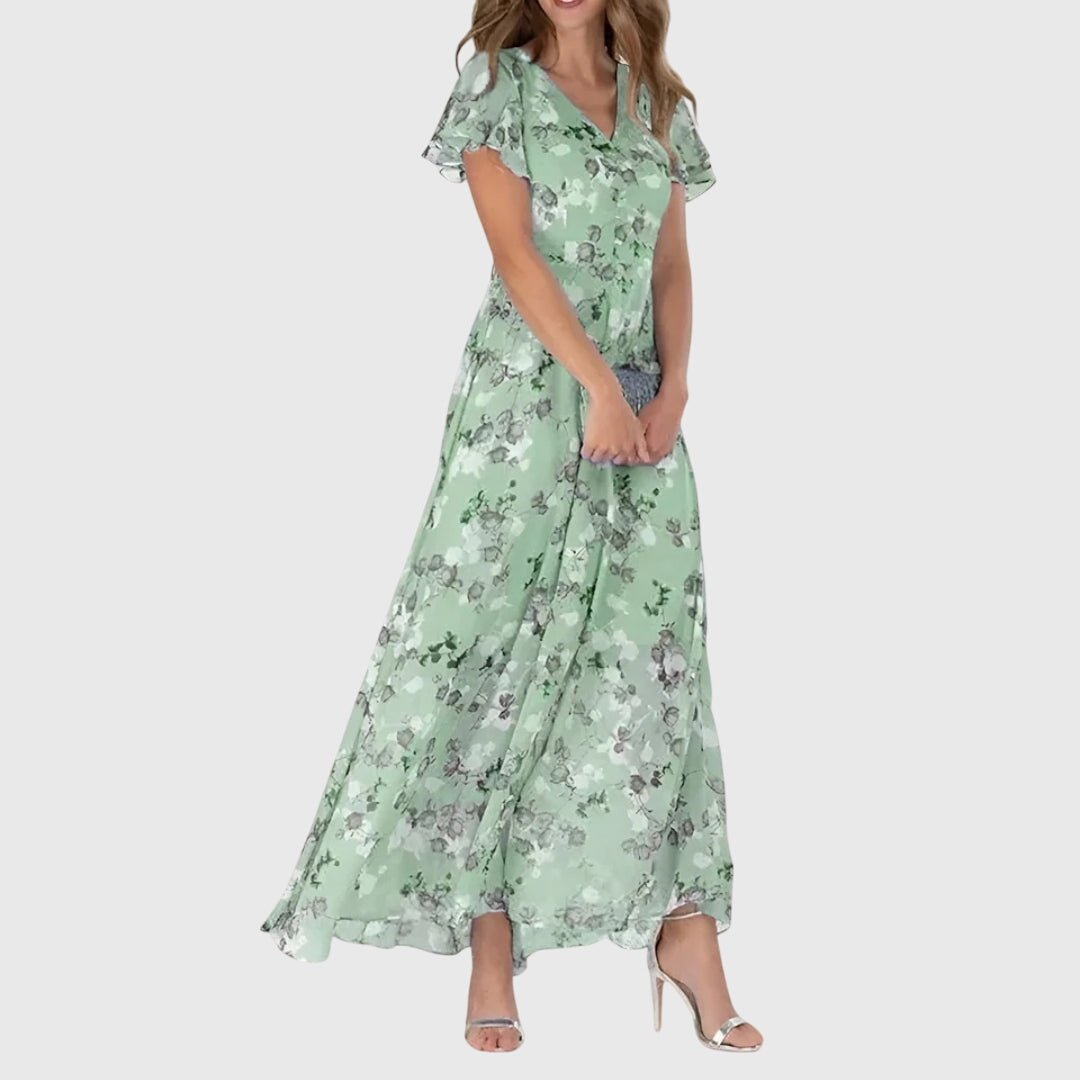 Elegant figure-flattering dress featuring a tailored fit, perfect for transitioning from day to night with style and comfort. 2