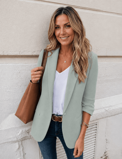 Fitted jacket featuring elegant details and a modern design, crafted from versatile high-quality fabric available in multiple colors. 1