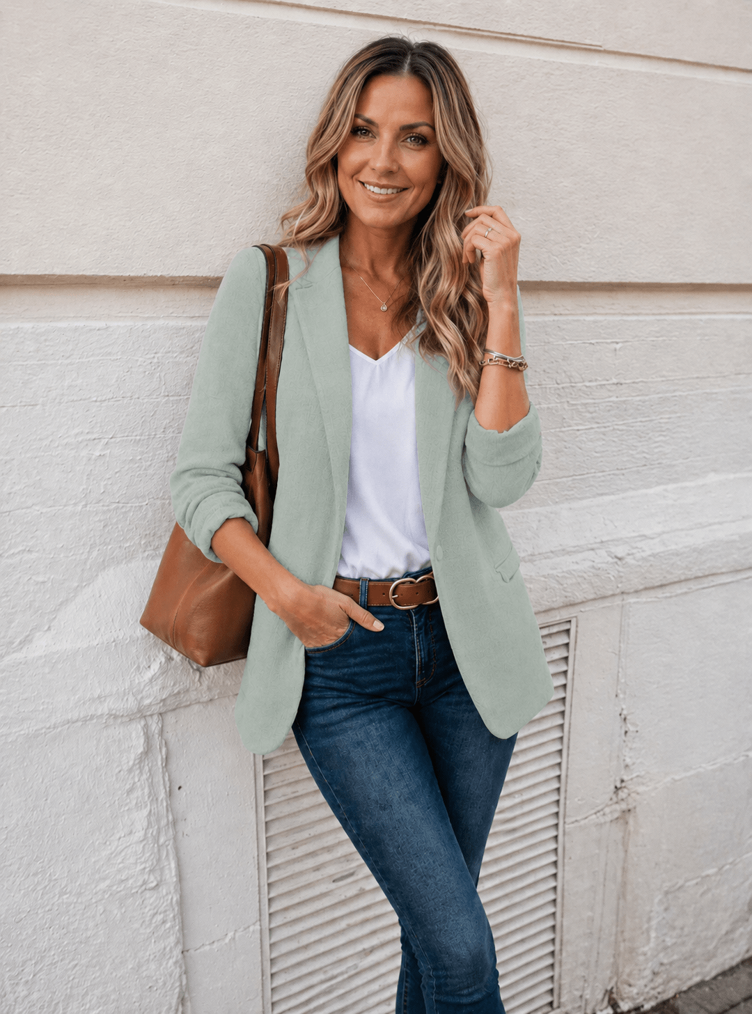Fitted jacket featuring elegant details and a modern design, crafted from versatile high-quality fabric available in multiple colors. 0