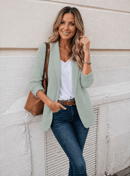 Fitted jacket featuring elegant details and a modern design, crafted from versatile high-quality fabric available in multiple colors. 0