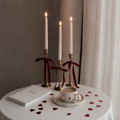 Flameless LED candle tapers for chandelier lighting in slim design, available in customizable finishes, offered in 4, 6, or 10 6