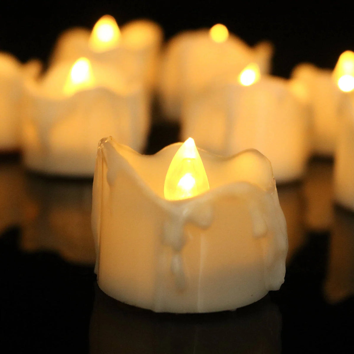 Flameless LED taper candle set in warm white light, 12 pack, perfect for elegant home decor, providing a safe and stylish ambiance. 2