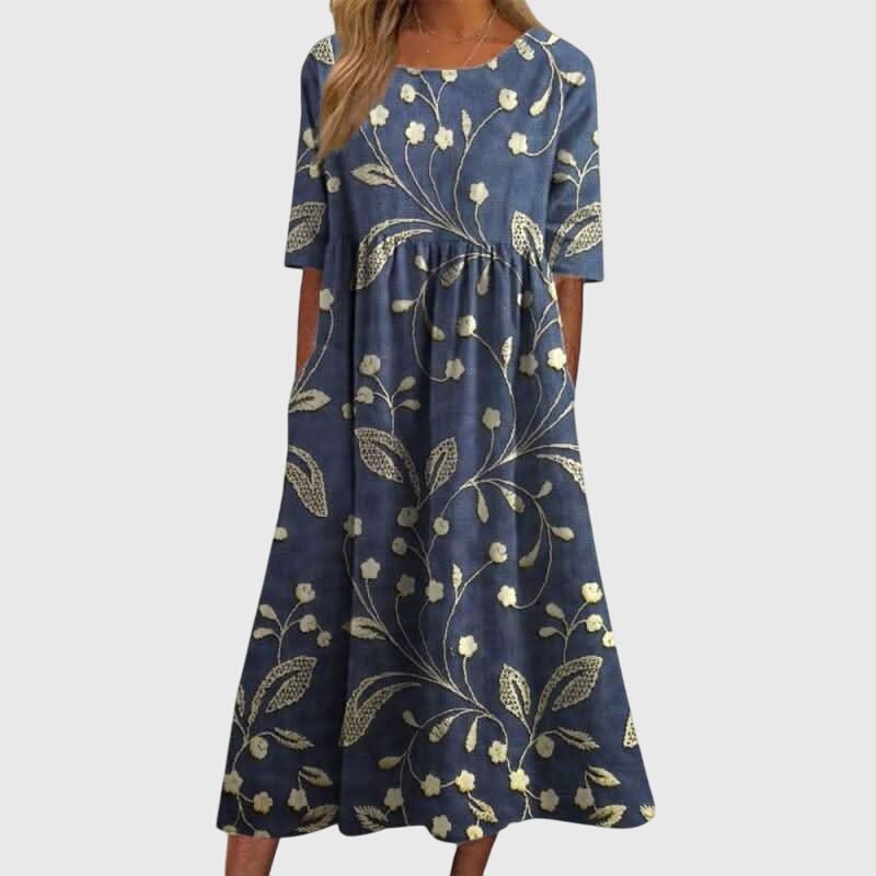 Flattering midi dress for women featuring intricate embroidered details, perfect for versatile summer styling for any occasion. 0