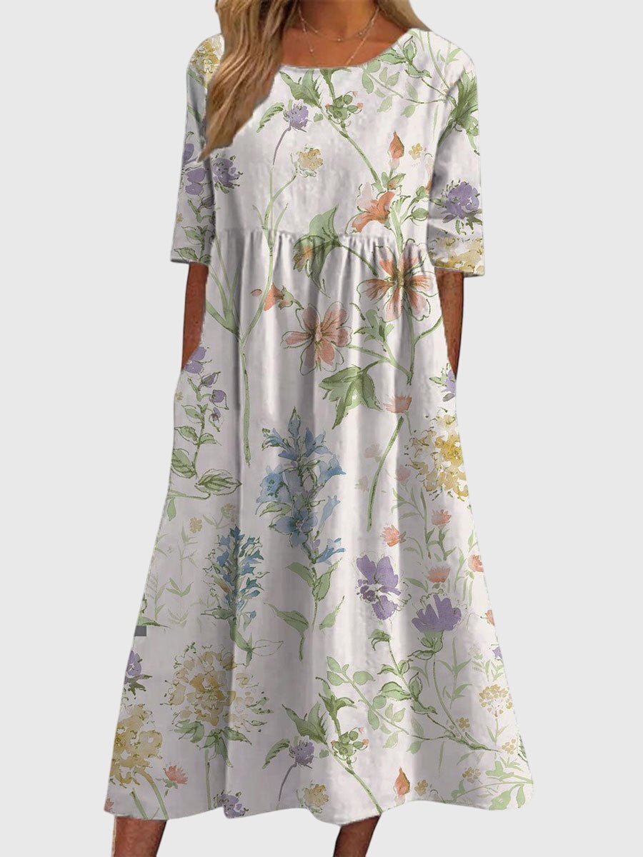 Flattering midi dress for women featuring intricate embroidered details, perfect for versatile summer styling for any occasion. 3