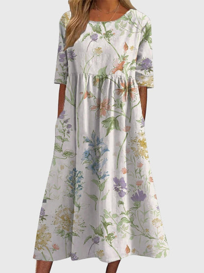 Flattering midi dress for women featuring intricate embroidered details, perfect for versatile summer styling for any occasion. 3