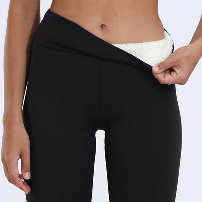 Fleece lined leggings for women featuring a high waist design, offering a warm stretch fit ideal for cold weather. 3