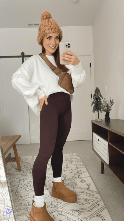 Fleece lined leggings for women featuring a high waist design, offering a warm stretch fit ideal for cold weather. 1