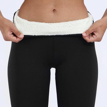 Fleece lined leggings for women featuring a high waist design, offering a warm stretch fit ideal for cold weather. 2