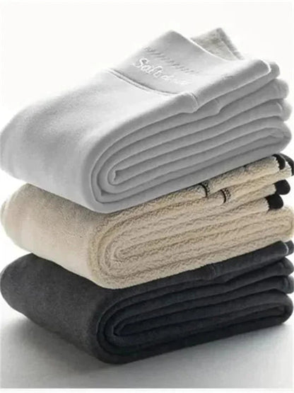 Fleece lined leggings for women featuring a slimming effect, made from ultra-soft warm stretch fabric, perfect for comfort and style in cold weather. 2