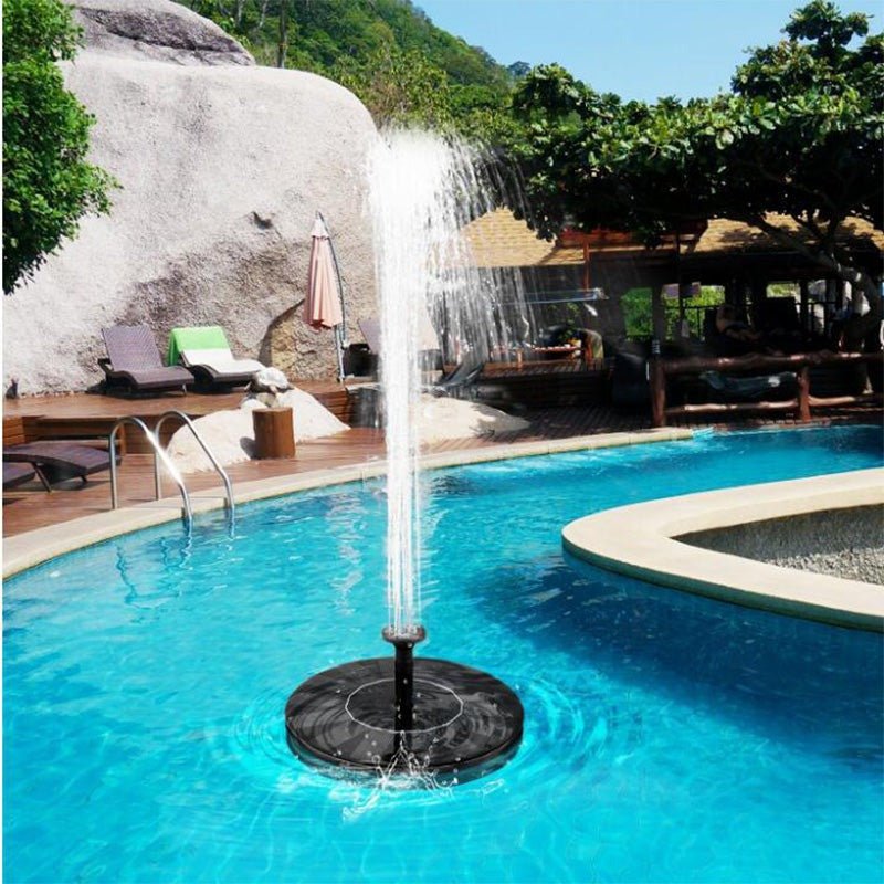 Floating solar fountain designed for garden ponds, featuring interchangeable water jet effects to enhance outdoor aesthetics and attract wildlife. 0