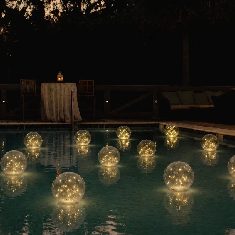 Floating solar lights for garden and pool featuring remote control functionality, available in warm white and multicolor options, perfect for enhancing outdoor ambiance and decor. 5