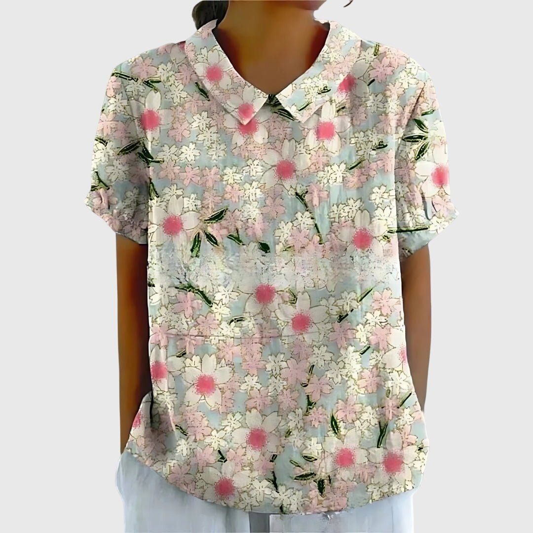 Floral blouse for women featuring a relaxed fit and lightweight fabric, perfect for summer casual wear in plus sizes. 5