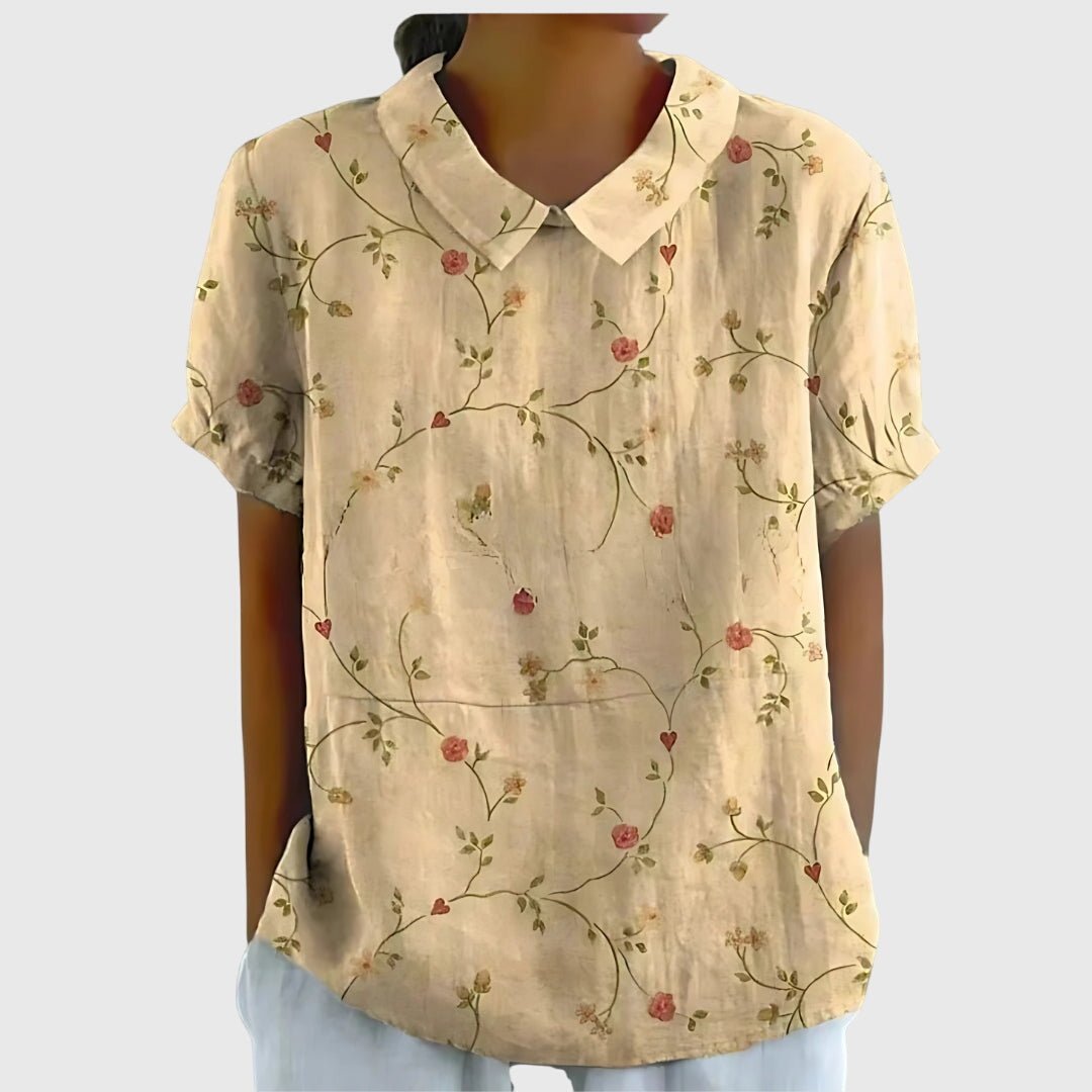 Floral blouse for women featuring a relaxed fit and lightweight fabric, perfect for summer casual wear in plus sizes. 2