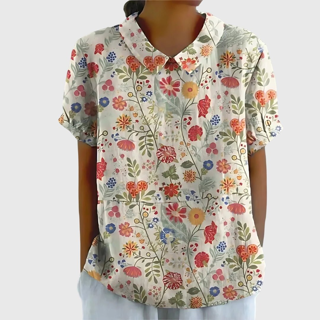 Floral blouse for women featuring a relaxed fit and lightweight fabric, perfect for summer casual wear in plus sizes. 10