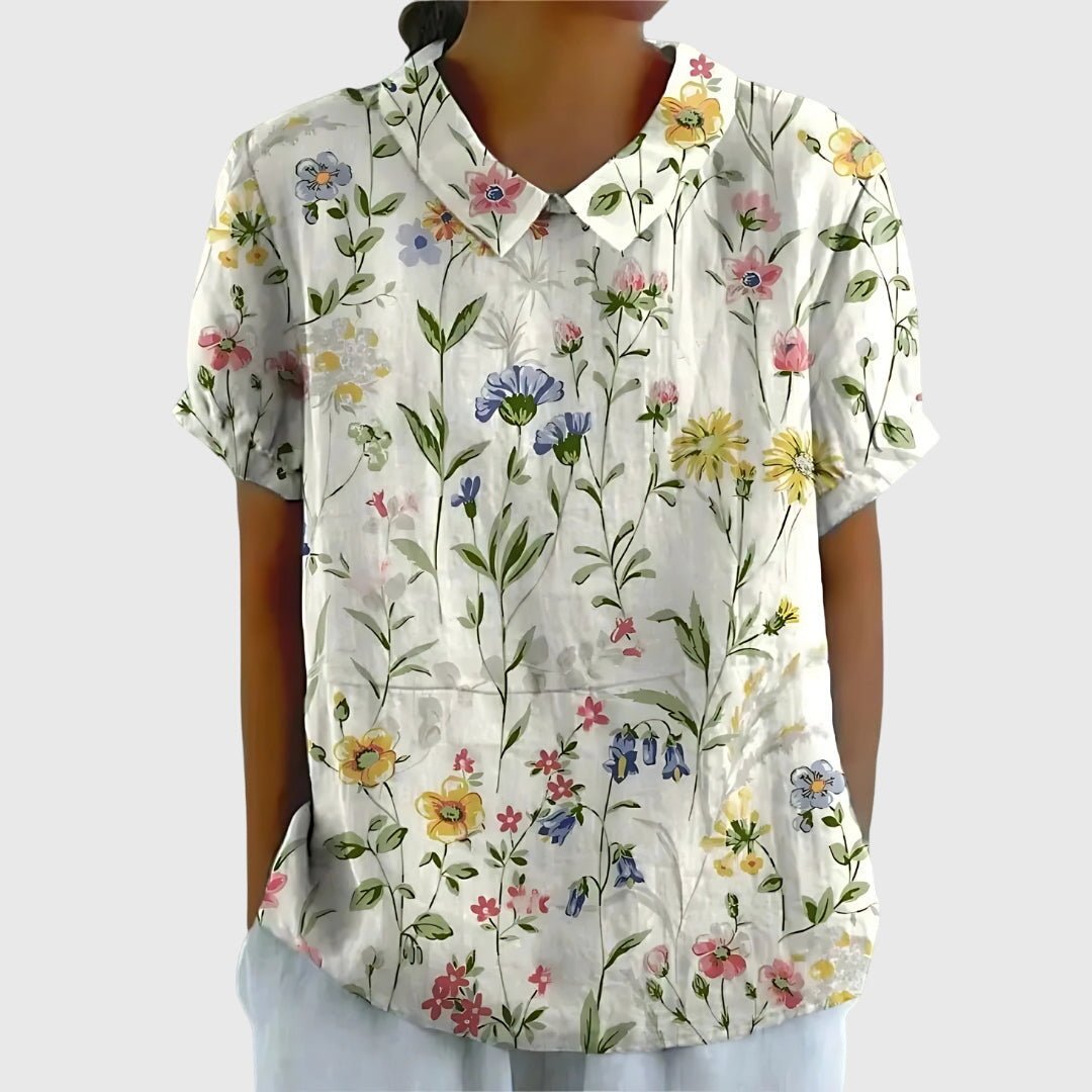 Floral blouse for women featuring a relaxed fit and lightweight fabric, perfect for summer casual wear in plus sizes. 3