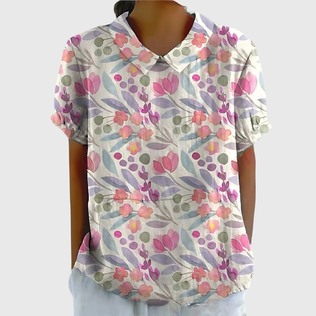 Floral blouse for women featuring a relaxed fit and lightweight fabric, perfect for summer casual wear in plus sizes. 9
