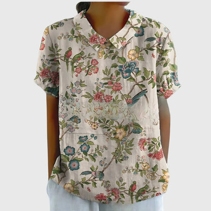 Floral blouse for women featuring a relaxed fit and lightweight fabric, perfect for summer casual wear in plus sizes. 6