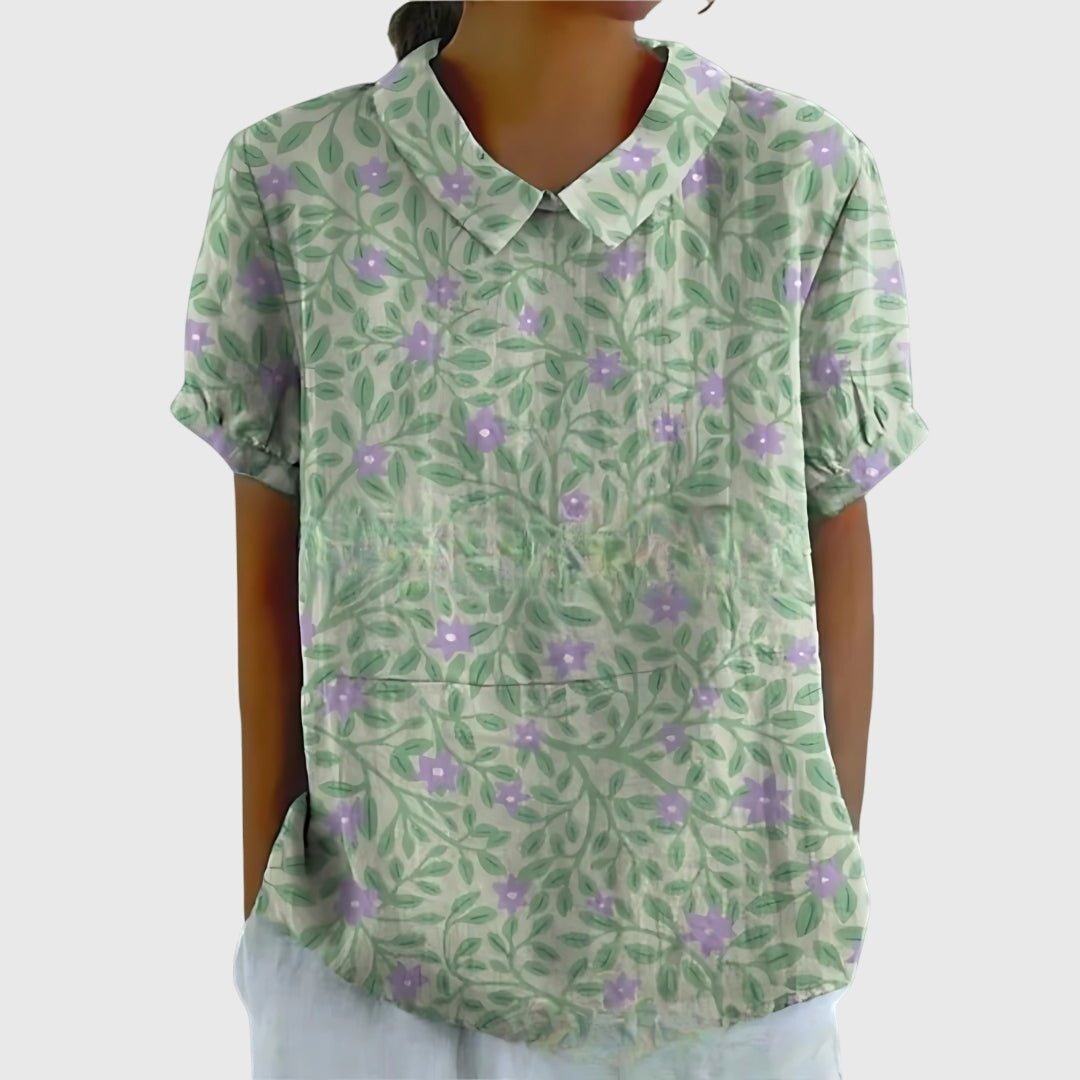 Lightweight floral blouse for women featuring a relaxed fit, perfect for summer, adorned with feminine prints. 8
