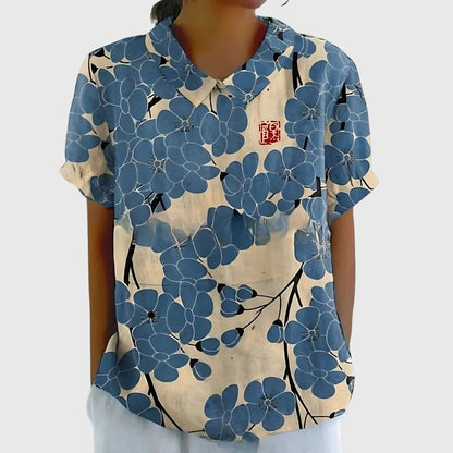 Lightweight floral blouse for women featuring a relaxed fit, perfect for summer, adorned with feminine prints. 4
