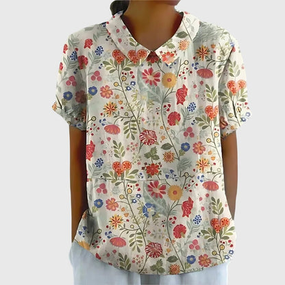 Lightweight floral blouse for women featuring a relaxed fit, perfect for summer, adorned with feminine prints. 9