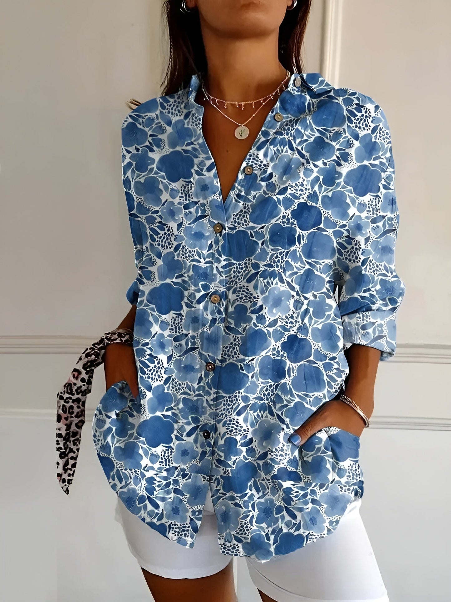 Floral button front blouse featuring an airy fit, perfect for women's summer casual outings. 1