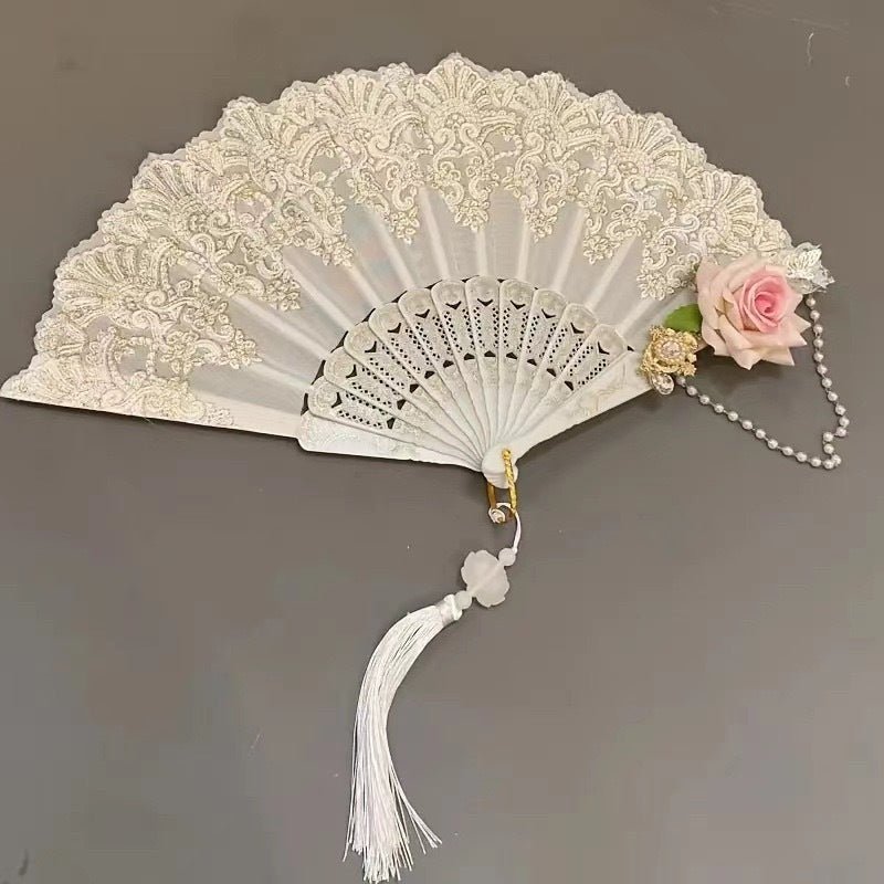 Floral folding fan with lace design, perfect for weddings and parties, showcasing an elegant and lightweight accessory for stylish occasions. 1